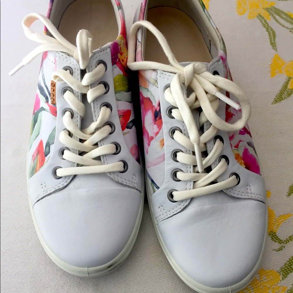 Ecco white sneakers with floral design .
